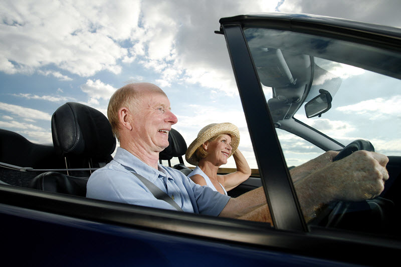 older driver enjoying a warm day